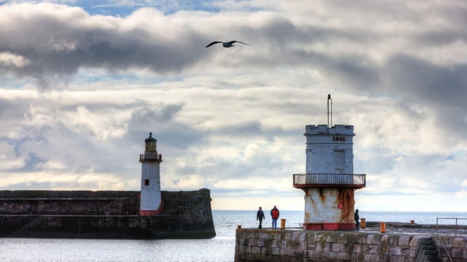 View of An Old Lighthouse on Cumbria's Coastal Town of Whitehaven on a Cloudy Day.