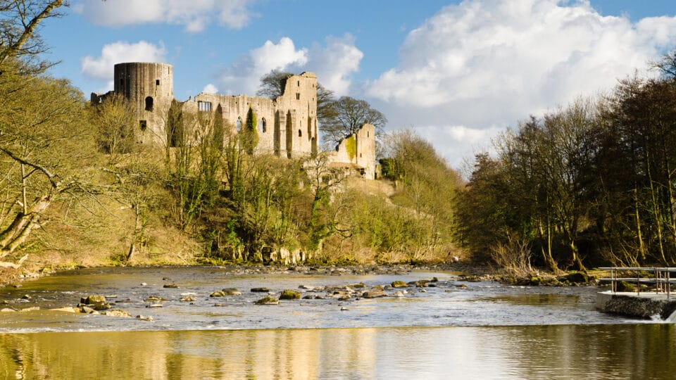 Ruins of Barnard Castle towering above the River Tees.