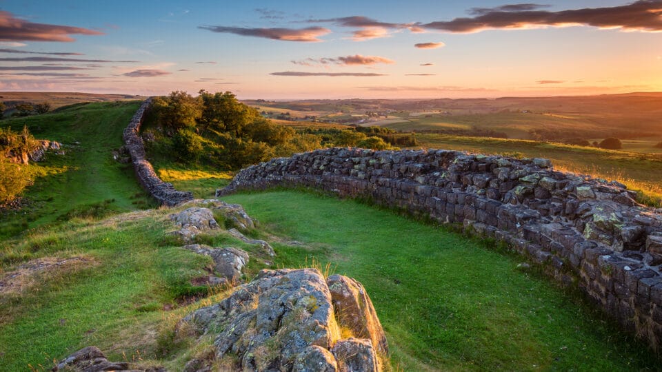 A View of Hadrian's Wall, a Heritage Site in The Northumberland National Park at Sunset.